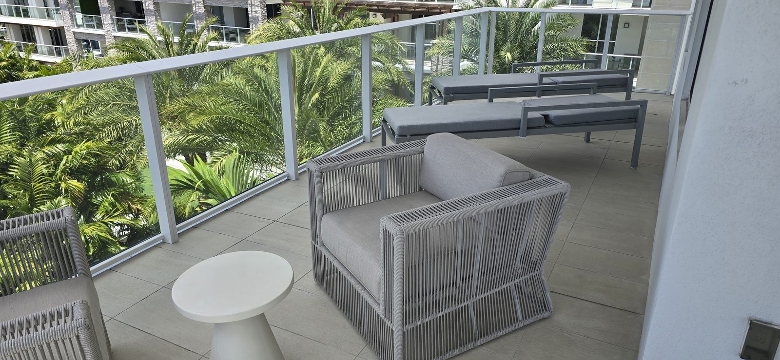 Freshly cleaned outdoor cushions on a balcony in West Palm Beach, FL